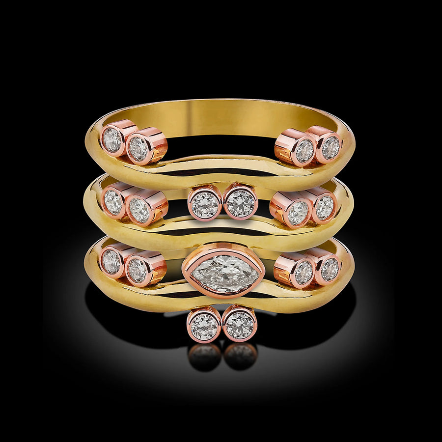 Single 18 Karat Yellow Gold Wave Ring with Marquise Diamond Center and 14 Karat Rose Gold Settings