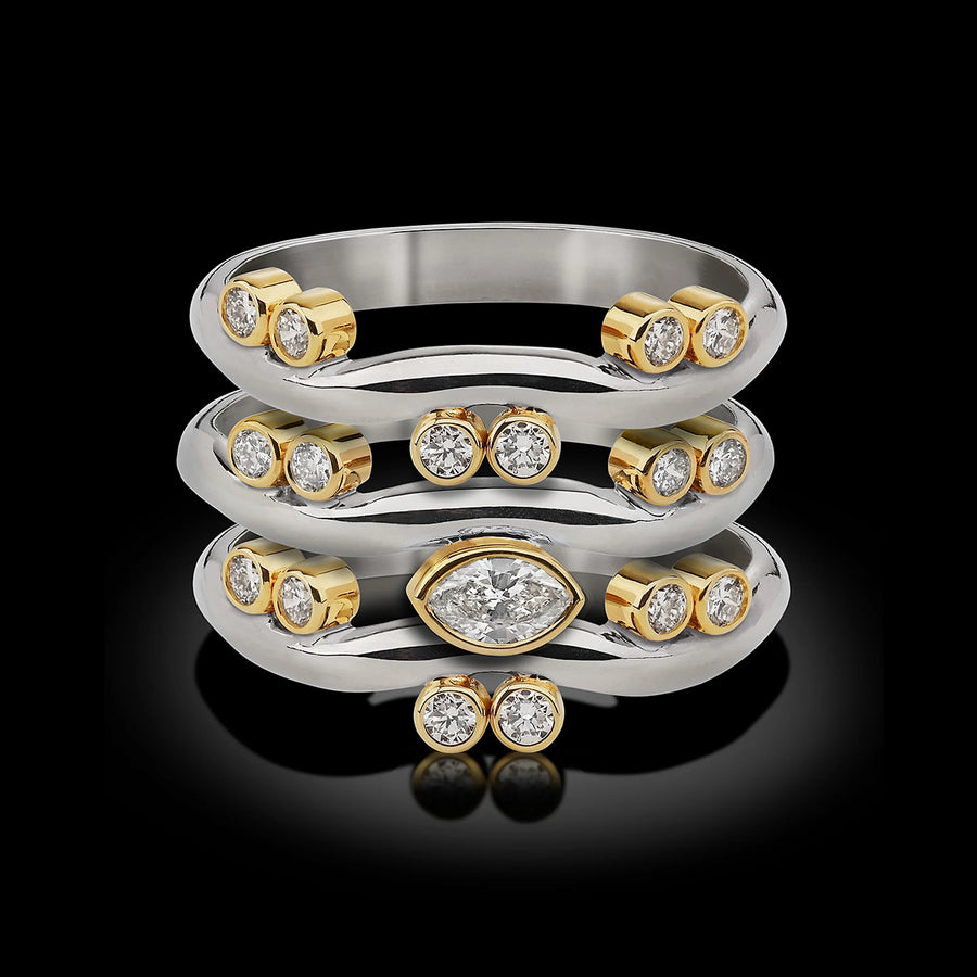 Single Platinum Wave Ring with Marquise Diamond Center and 18 Karat Yellow Gold Settings